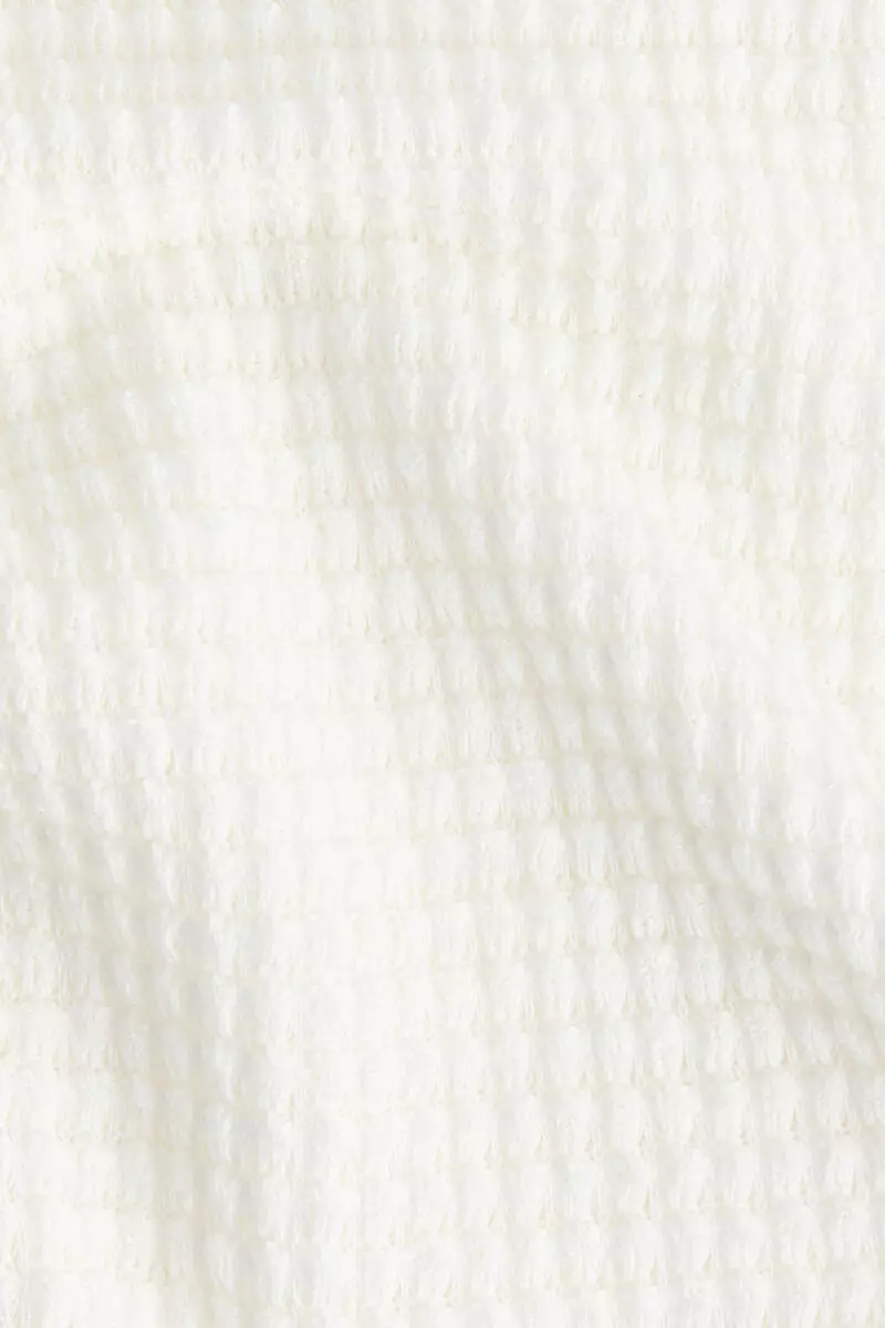 Batwing-sleeved jersey top