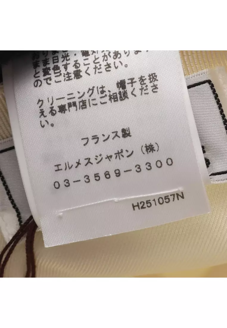 Pre-Loved Hermès Davis Pois Medor cap cotton ivory