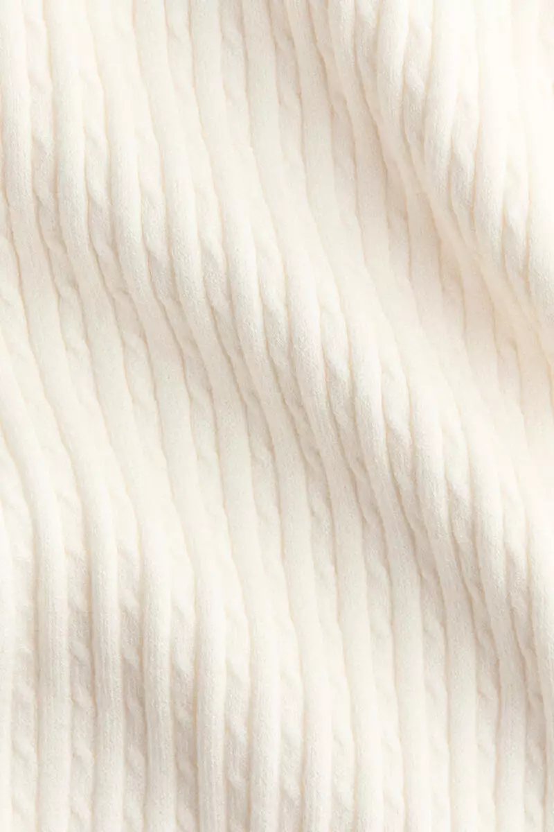 Flared cable-knit trousers