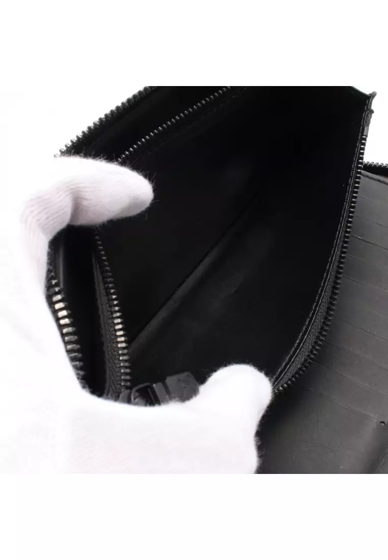 Pre-Loved Louis Vuitton zippy wallet Vertical monogram shadow round zipper long wallet leather black