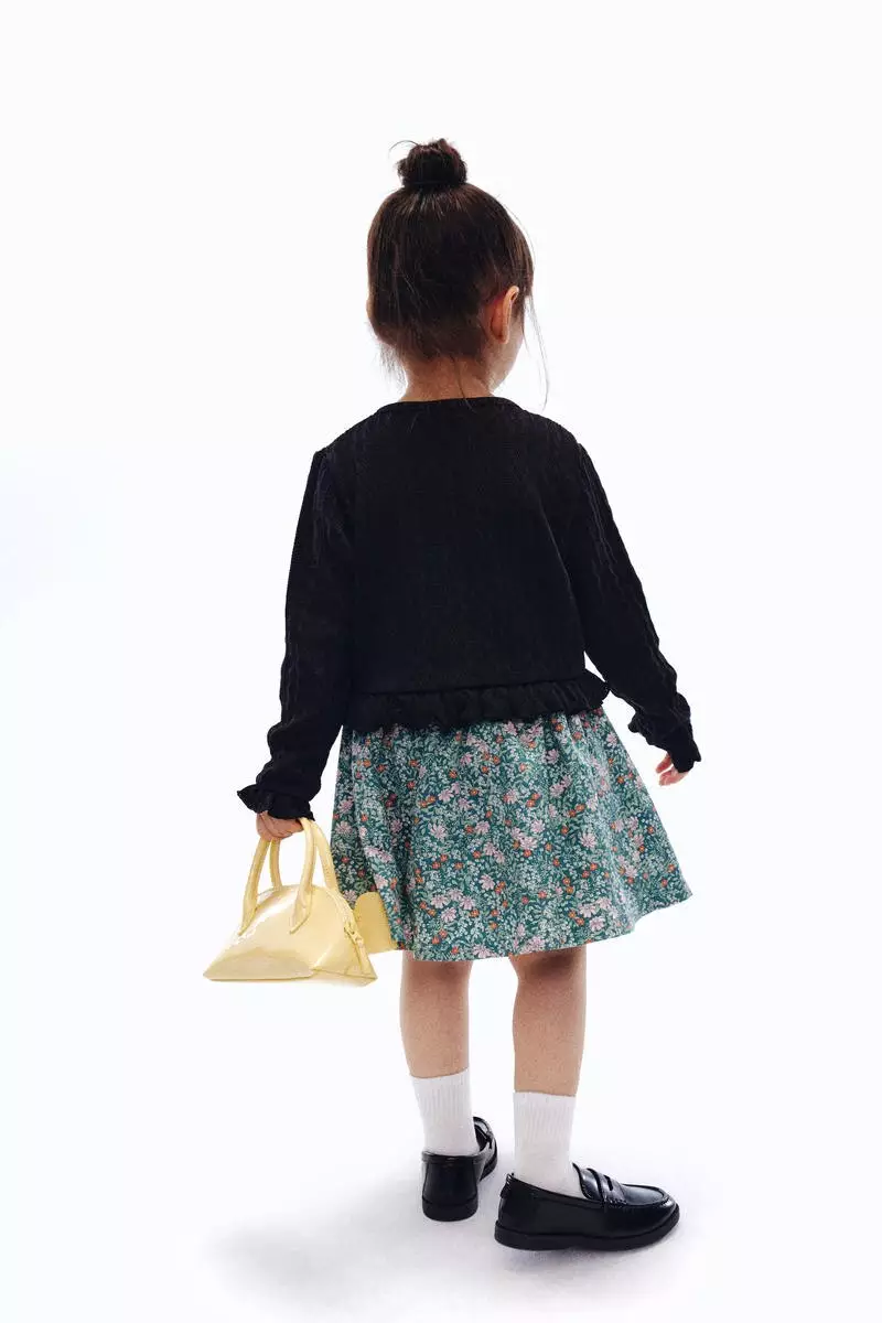 Cable-knit frill-trimmed cardigan