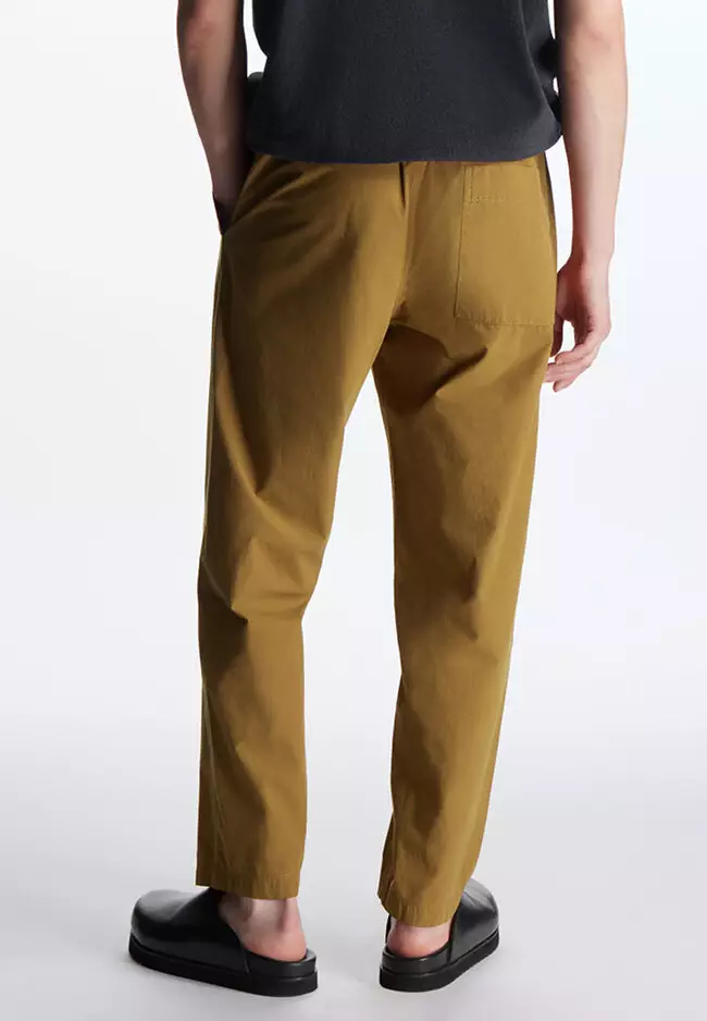 Buy COS Relaxed-Fit Tapered Trousers 2024 Online