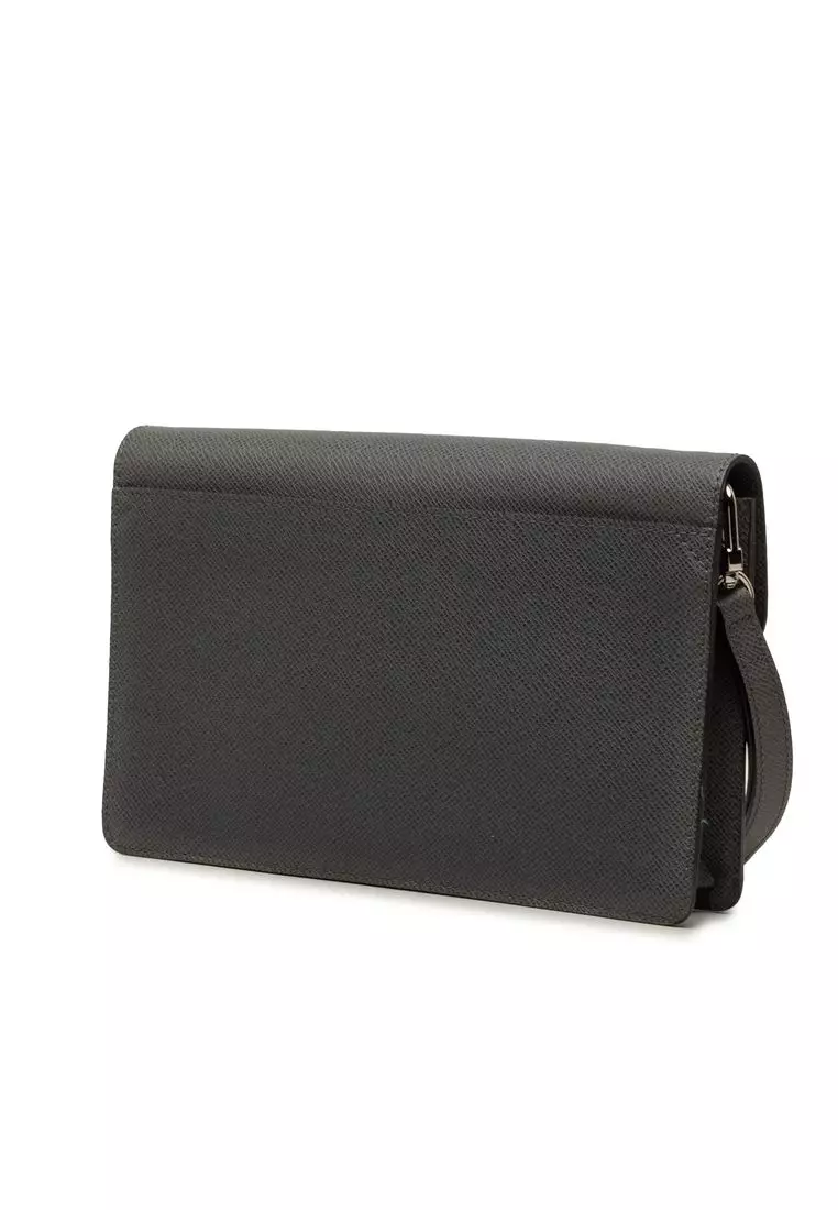 Pre-Loved Louis Vuitton Taiga Neo Belaia Clutch
