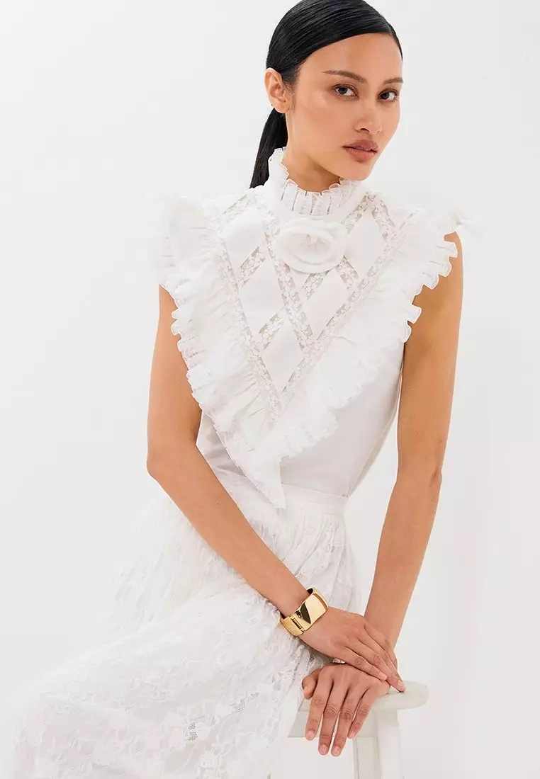 The Rosette Ruffle Top