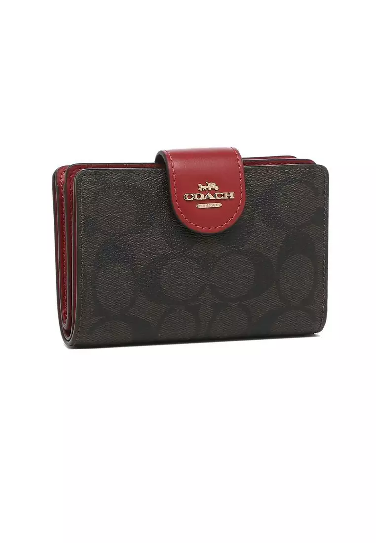Red and black coach wallet top