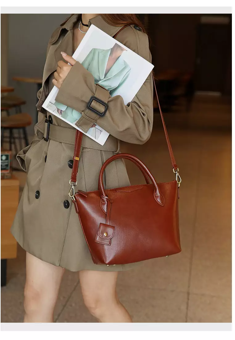 Fashion niche high-end genuine leather hand-held crossbody bag