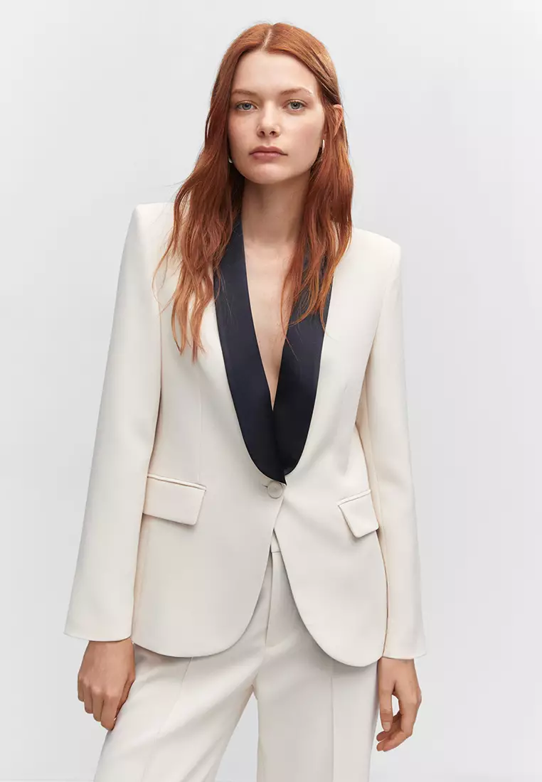 White blazer black top collar