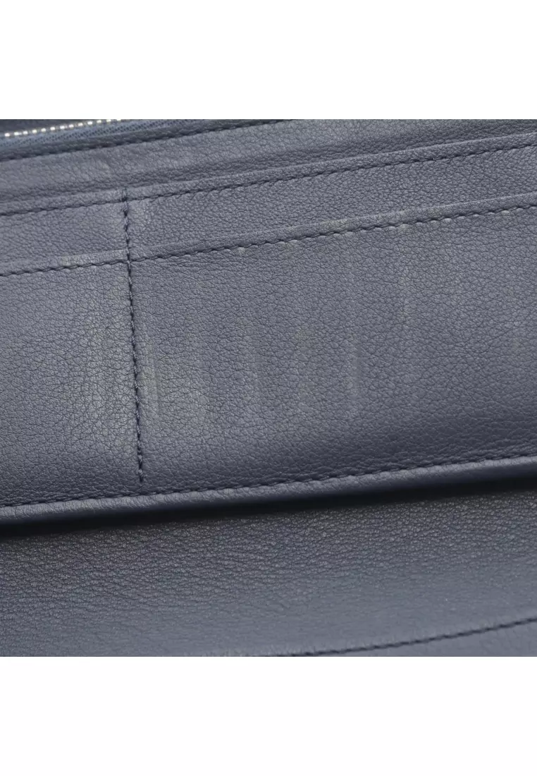 Pre-Loved Louis Vuitton zippy wallet Vertical round zipper long wallet taurillon leather Dark navy