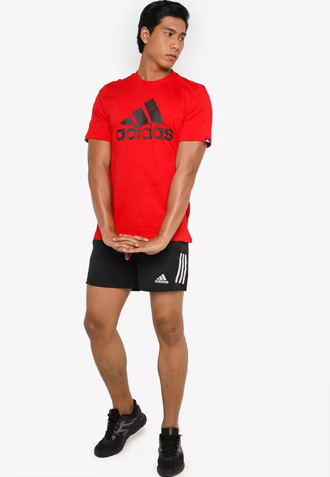 Red adidas running shorts top