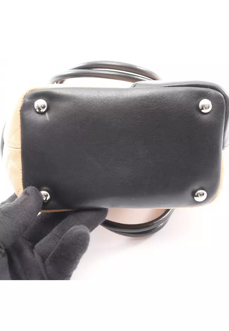 Pre-Loved Chanel Cambon line Small Handbag tote bag leather beige black silver hardware