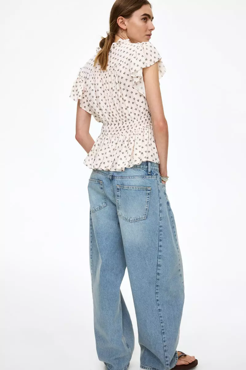 Flutter-sleeved peplum blouse