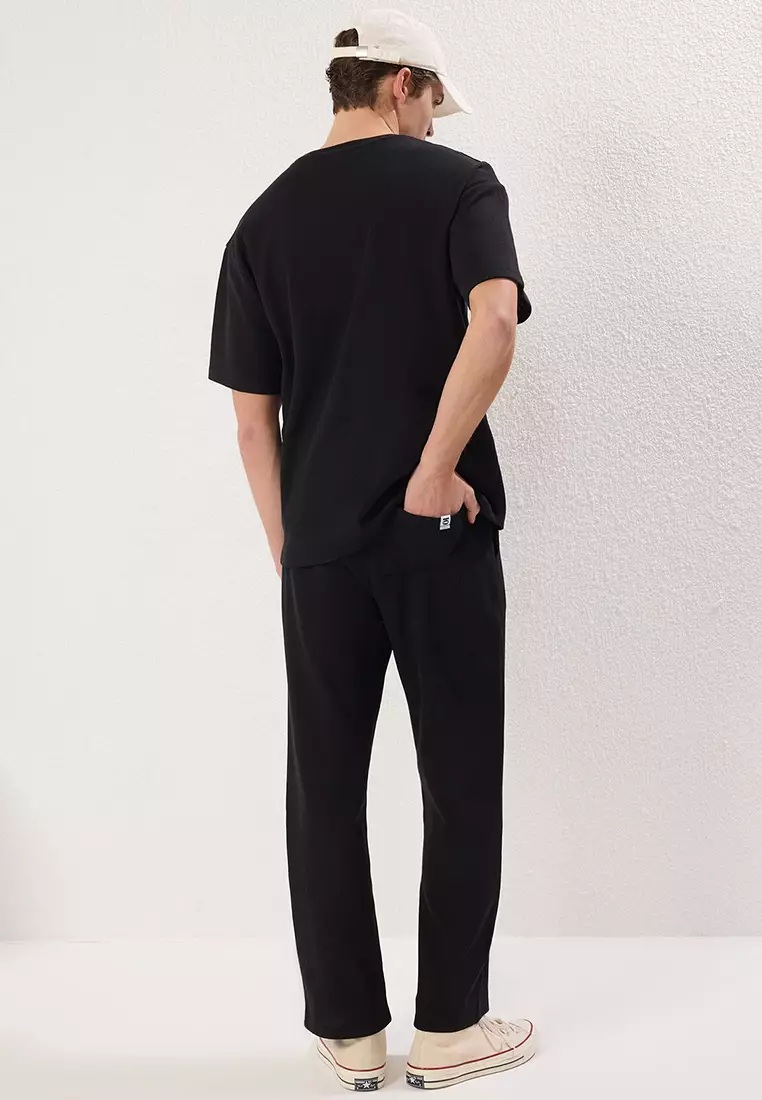Black Oversize/Wide Cut Textured Tracksuit TMNSS25EM00010