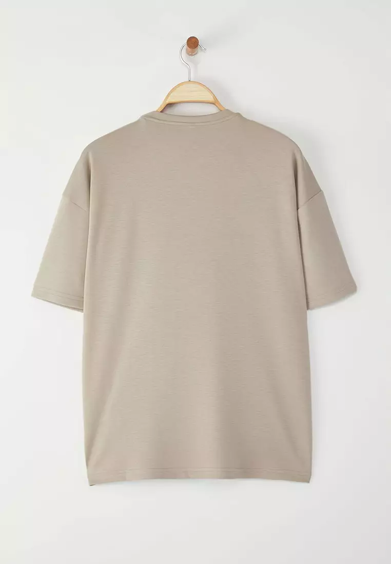 stone Oversize/Wide Cut Metal Label Detail Soft Tissue Interlock Fabric T-Shirt TMNSS25TS00105