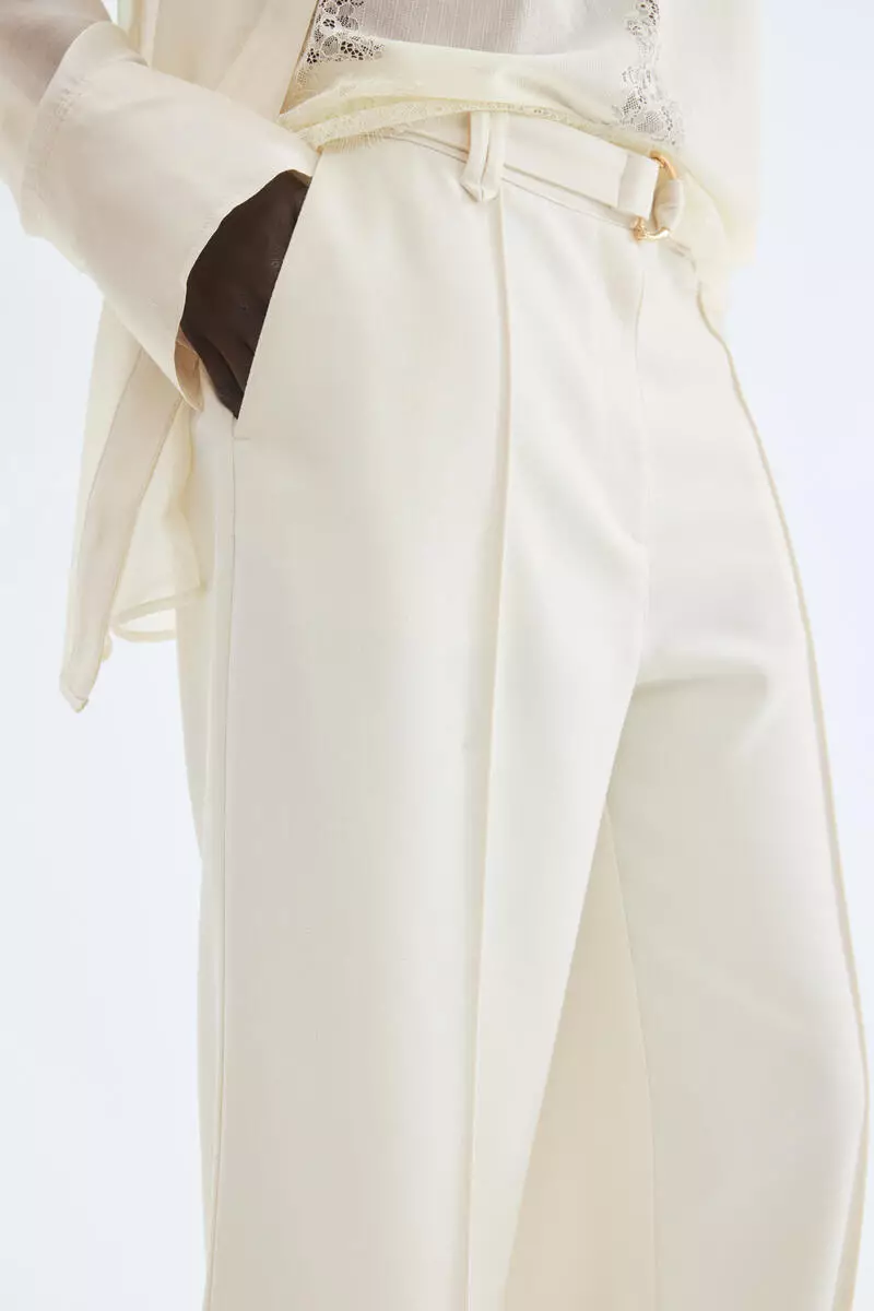 Flared belted trousers