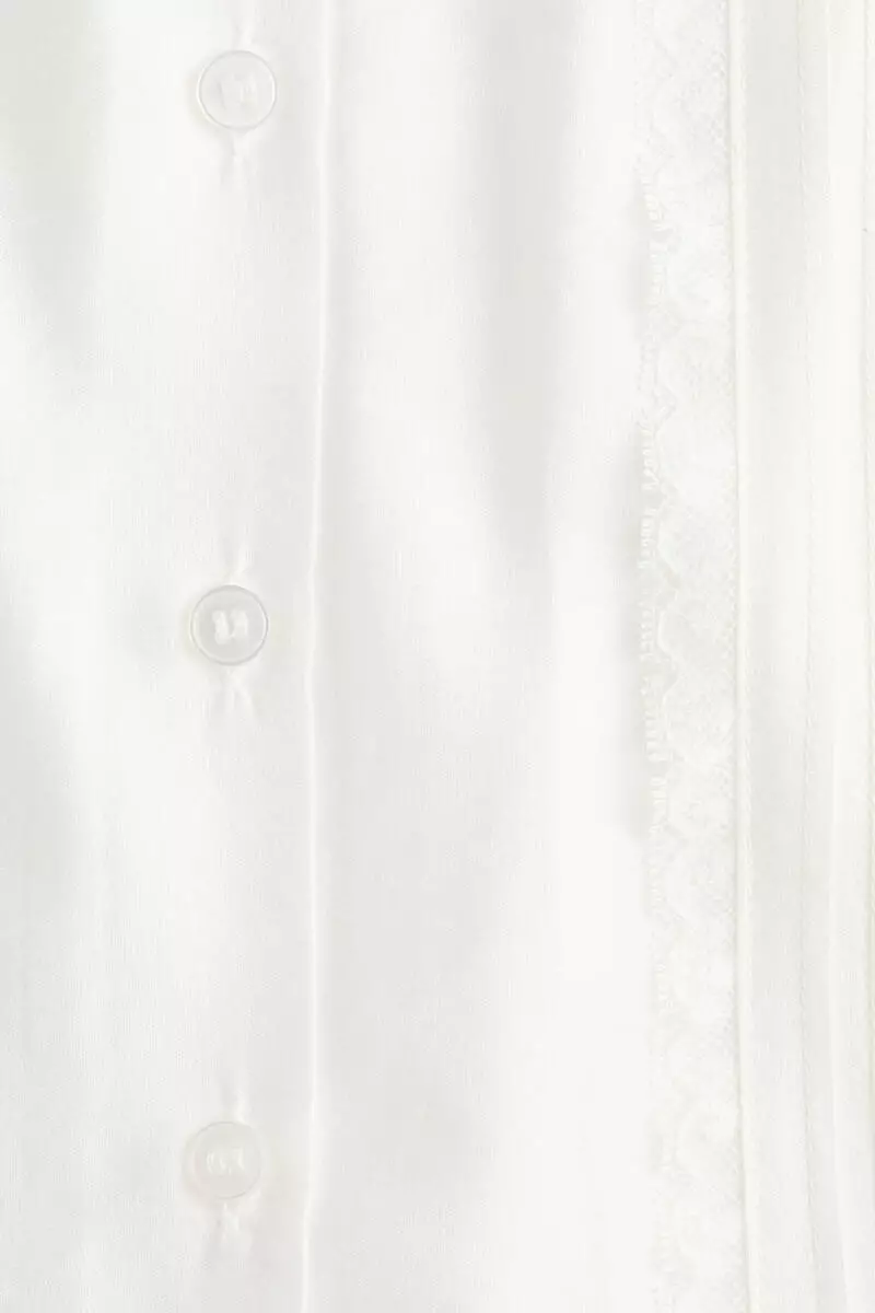 Frill-trimmed button-front blouse