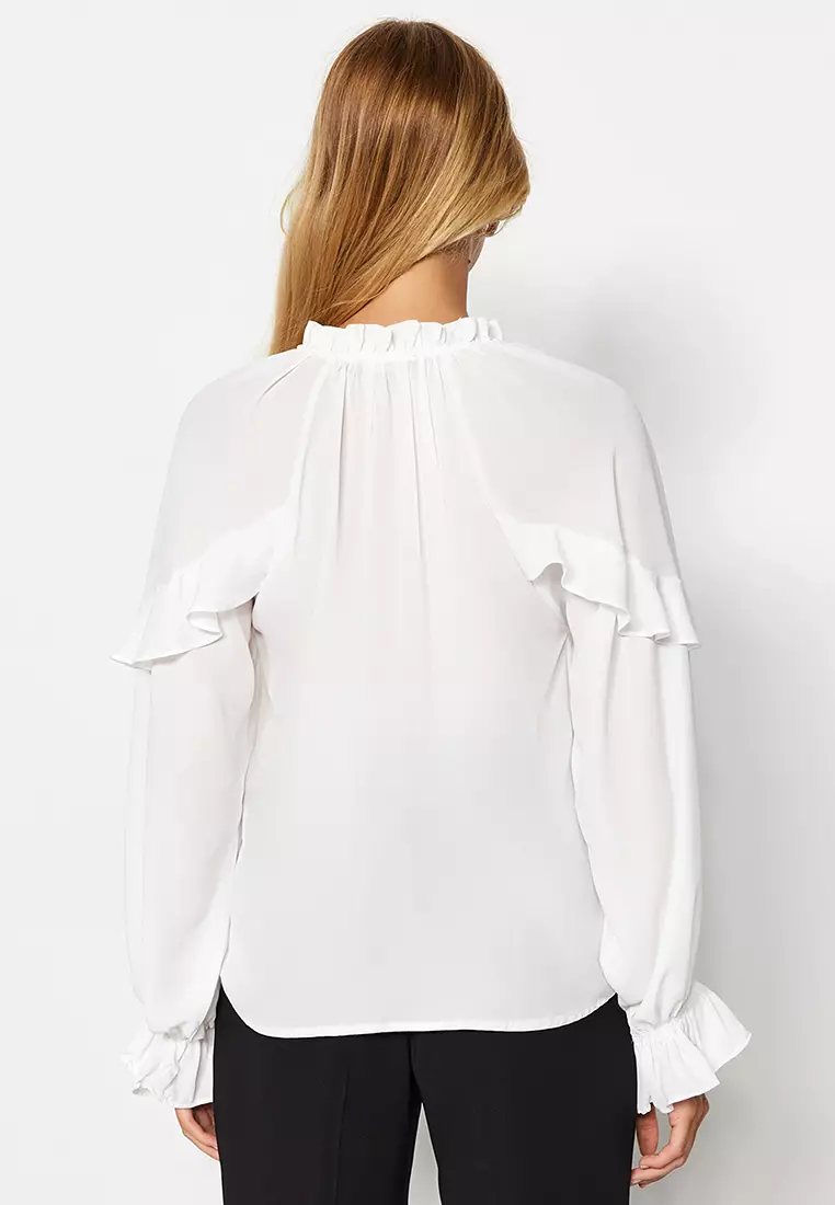 white flared sleeve blouse