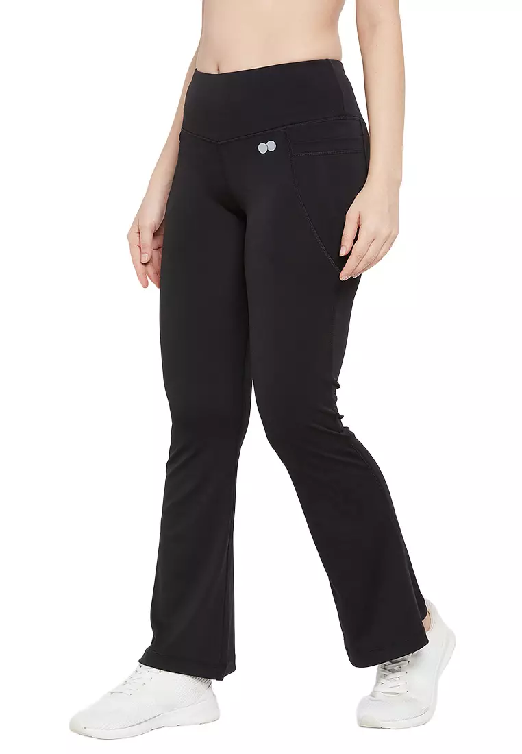 Clovia High Waist Flared Yoga Pants in Black with Side Pockets