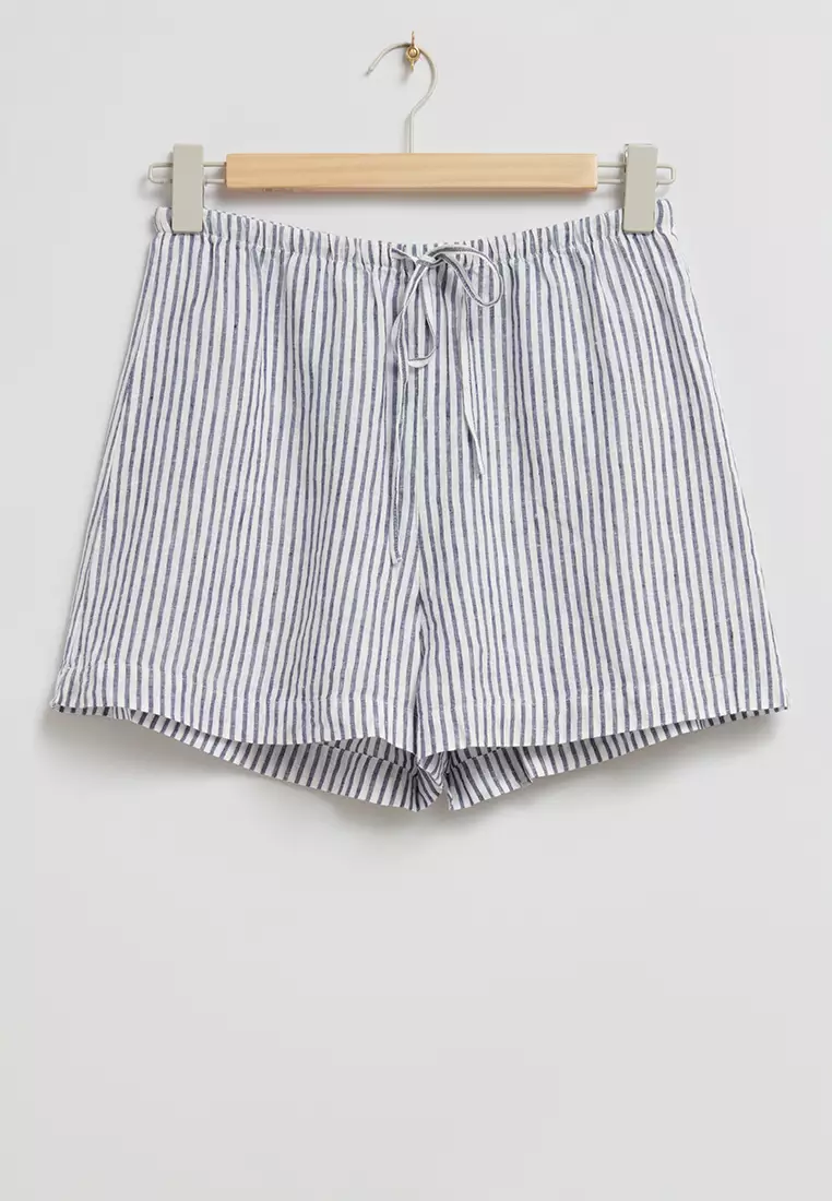 White linen drawstring shorts top