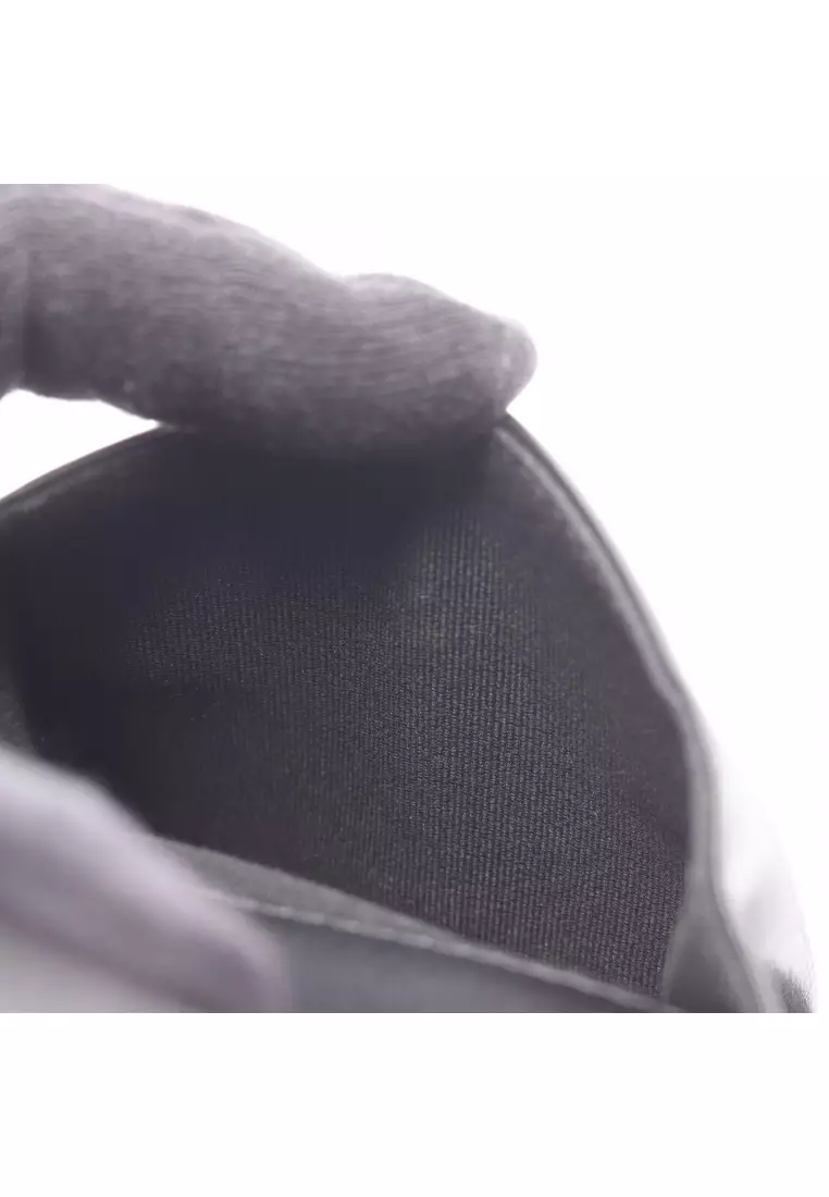 Pre-Loved Chanel matelasse Bi-fold wallet leather black silver hardware