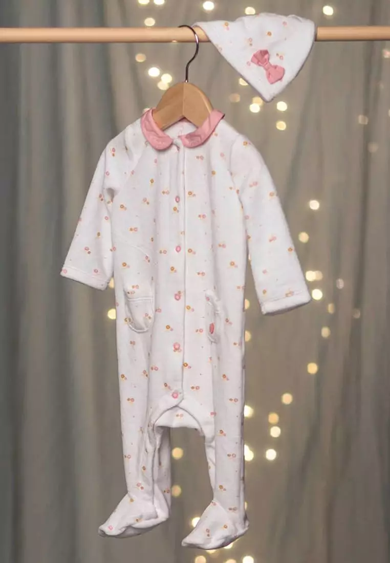 Off white sleepsuit and floral print beanie