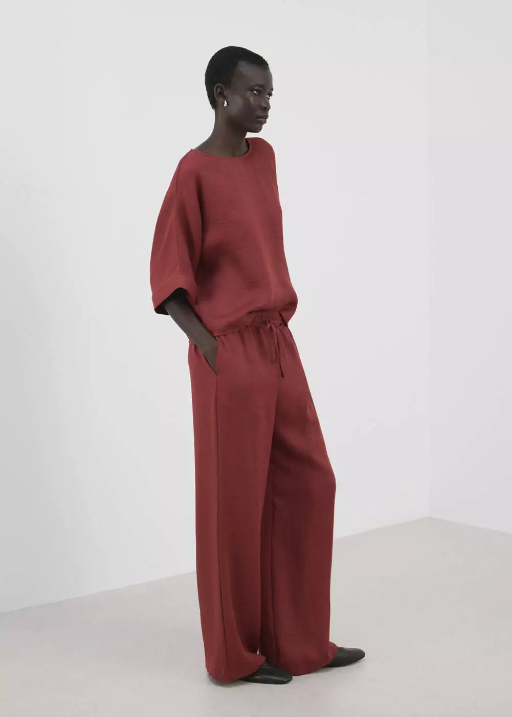 Blus lengan tiga perempat