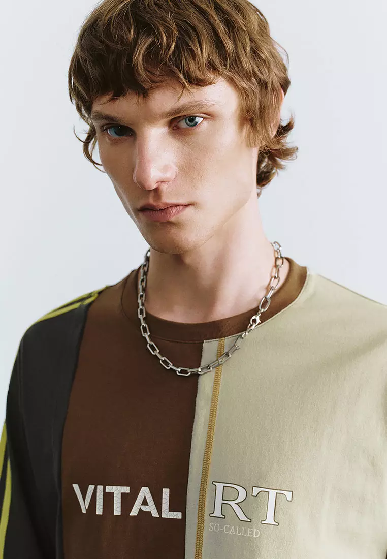 UR冬季新款男街头风解构设计感字母拼色长袖T恤UMV440158