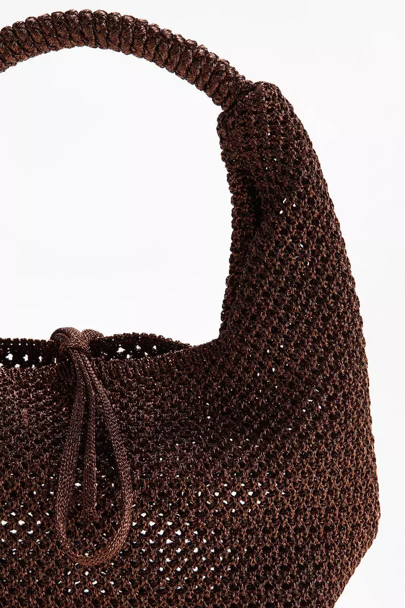 Glittery hole-knit handbag