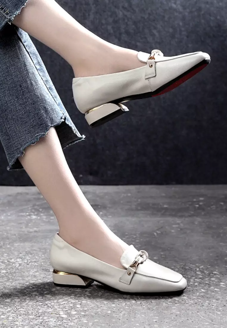 White pointed shop toe loafers