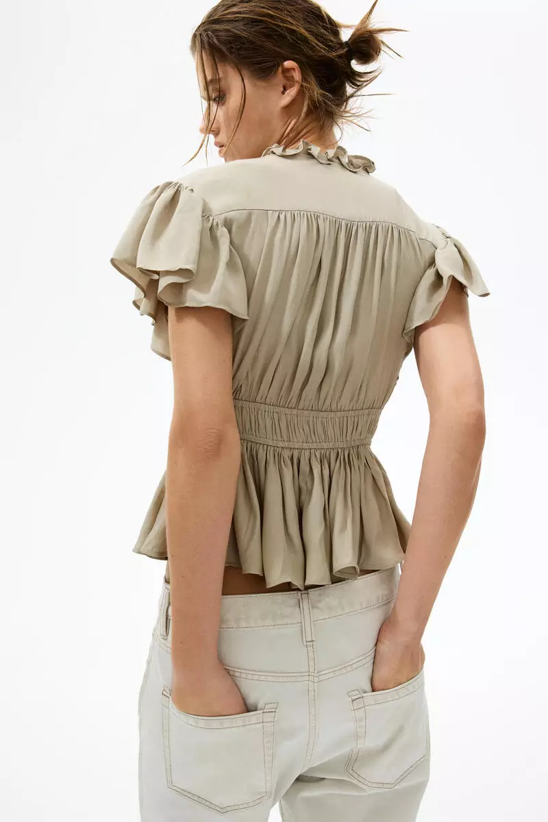 Flutter-sleeved peplum blouse