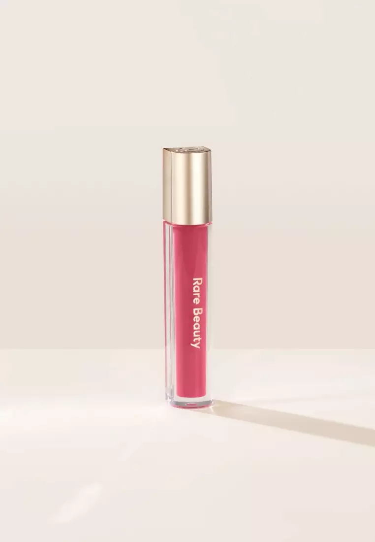 Buy Rare Beauty Stay Vulnerable Glossy Lip Balm in Nearly Rose 2024