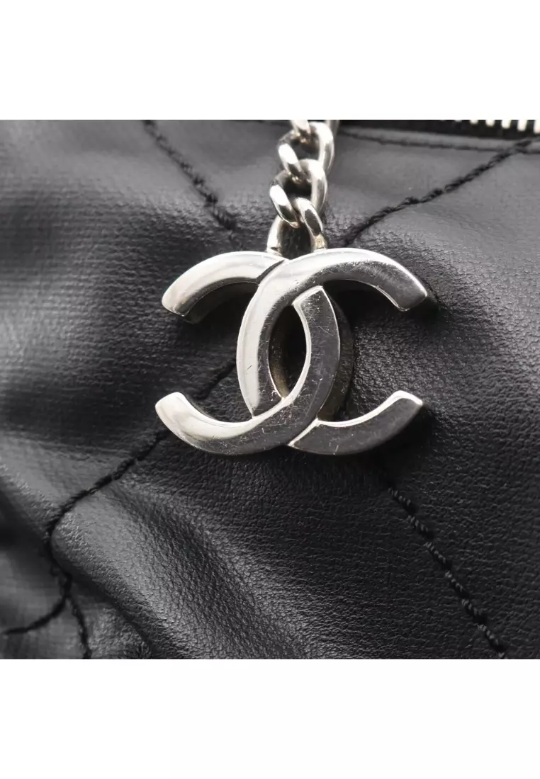 Pre-Loved Chanel Paris Biarritz GM Handbag tote bag Coated canvas leather black silver hardware