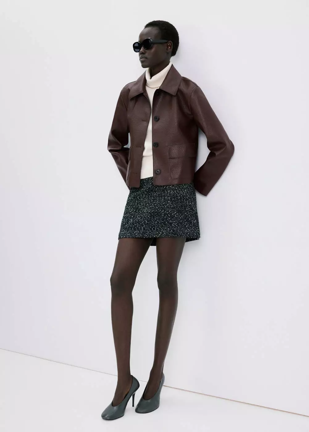 Jaket kulit sintetis dengan saku