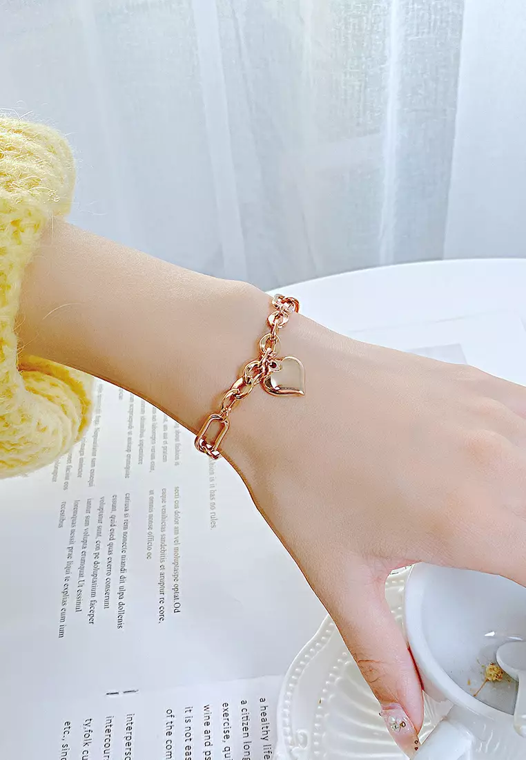 Gold heart link bracelet on sale