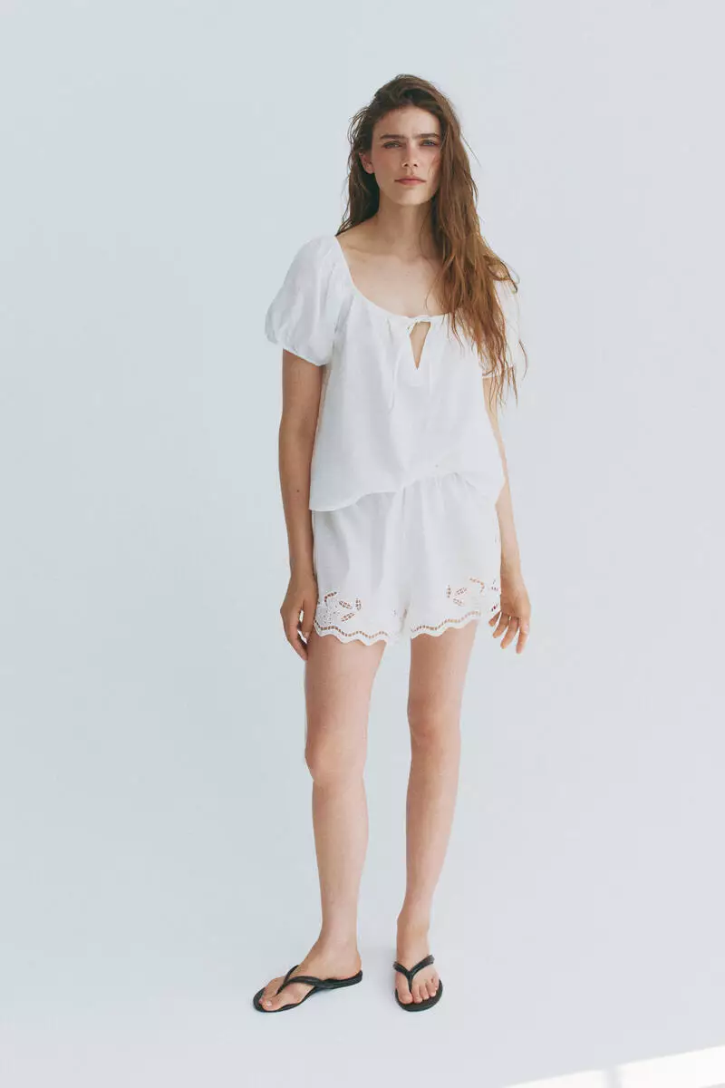 Puff-sleeved linen-blend blouse