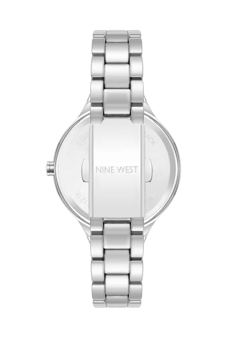 Nine West NW2225LPSV0000 silver tone round watch with light pink dial