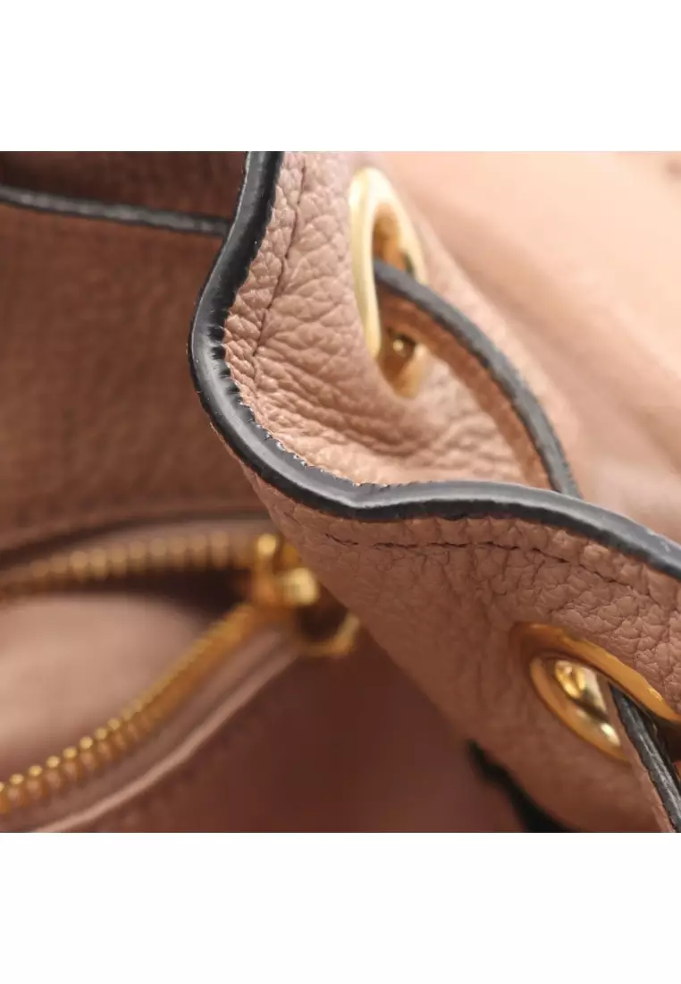 Pre-Loved MIU MIU Handbag leather pink beige 2WAY drawstring