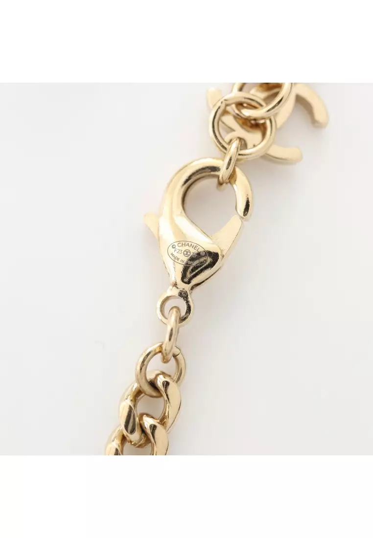 Pre-Loved Chanel choker heart logo GP Rhinestone gold clear F23B