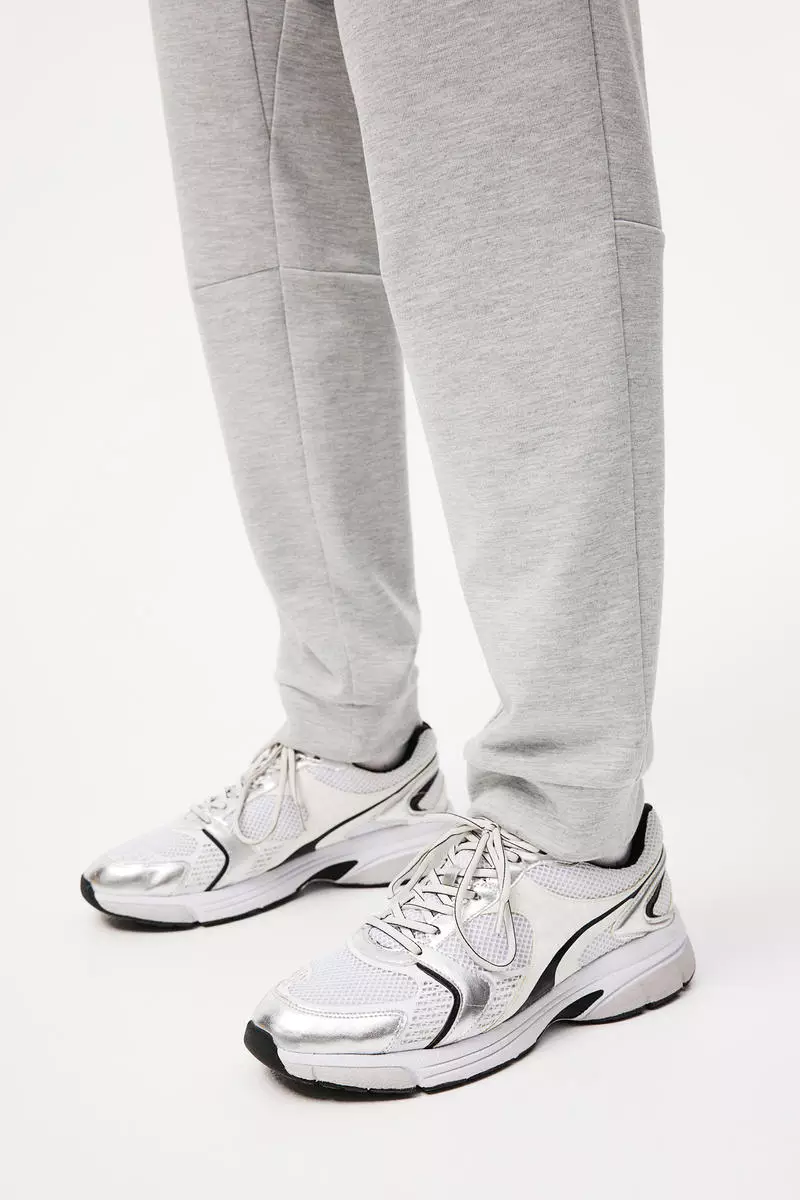 Buy H&M DryMove™ Tapered tech joggers with zipped pockets 2024 Online