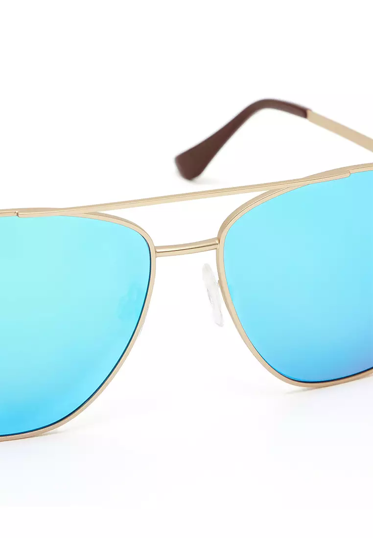 HAWKERS Gold Clear Blue LAX Sunglasses for Men and Women. UV400 Protection. Official Product Designed in Spain
