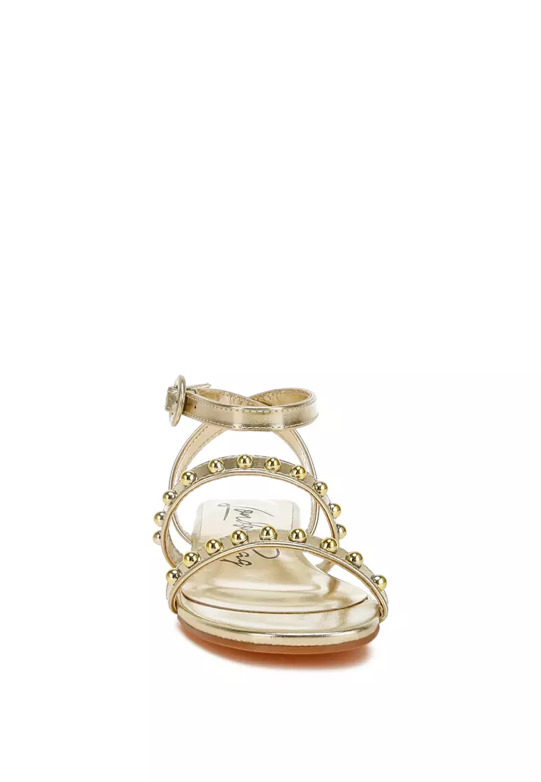 Studded Ankle Strap Flat Sandals in Gold