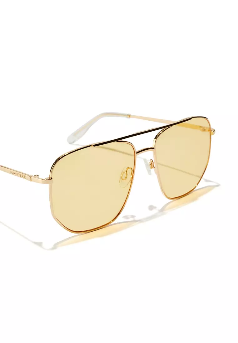 HAWKERS Gold Yellow CAD Sunglasses for Men and Women, Unisex. UV400 Protection. Official Product designed in Spain