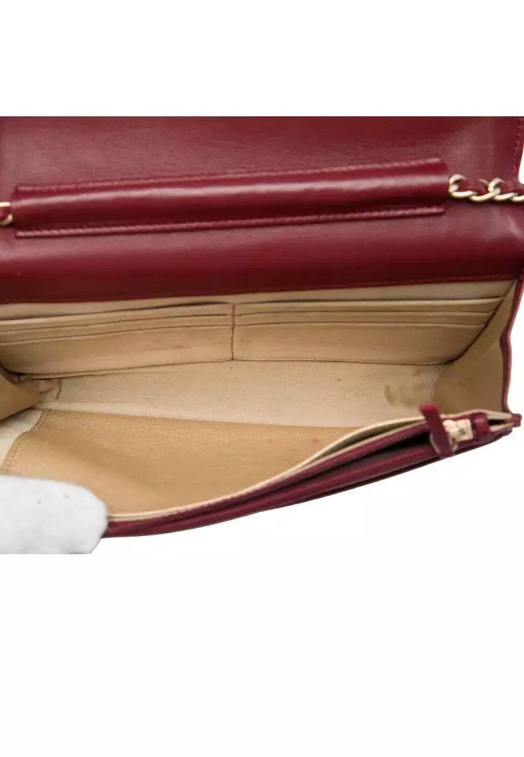 Pre-Loved Chanel Cc Embossed Calfskin Camellia Wallet On Chain