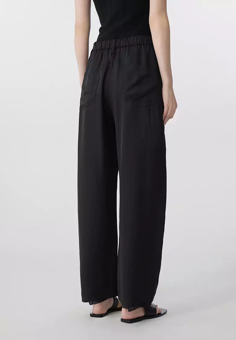 Curled extra-long trousers