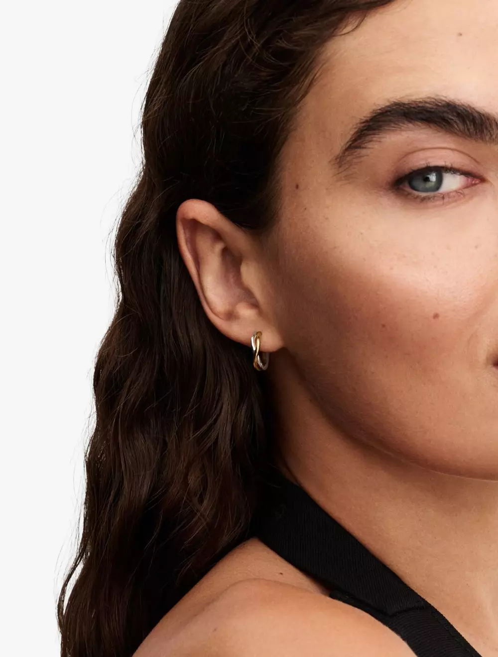 Organically shaped sterling silver and 14k gold-plated hoop earrings