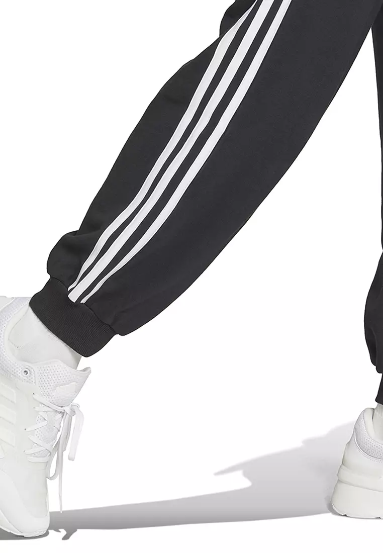 White adidas joggers hot sale with black stripes