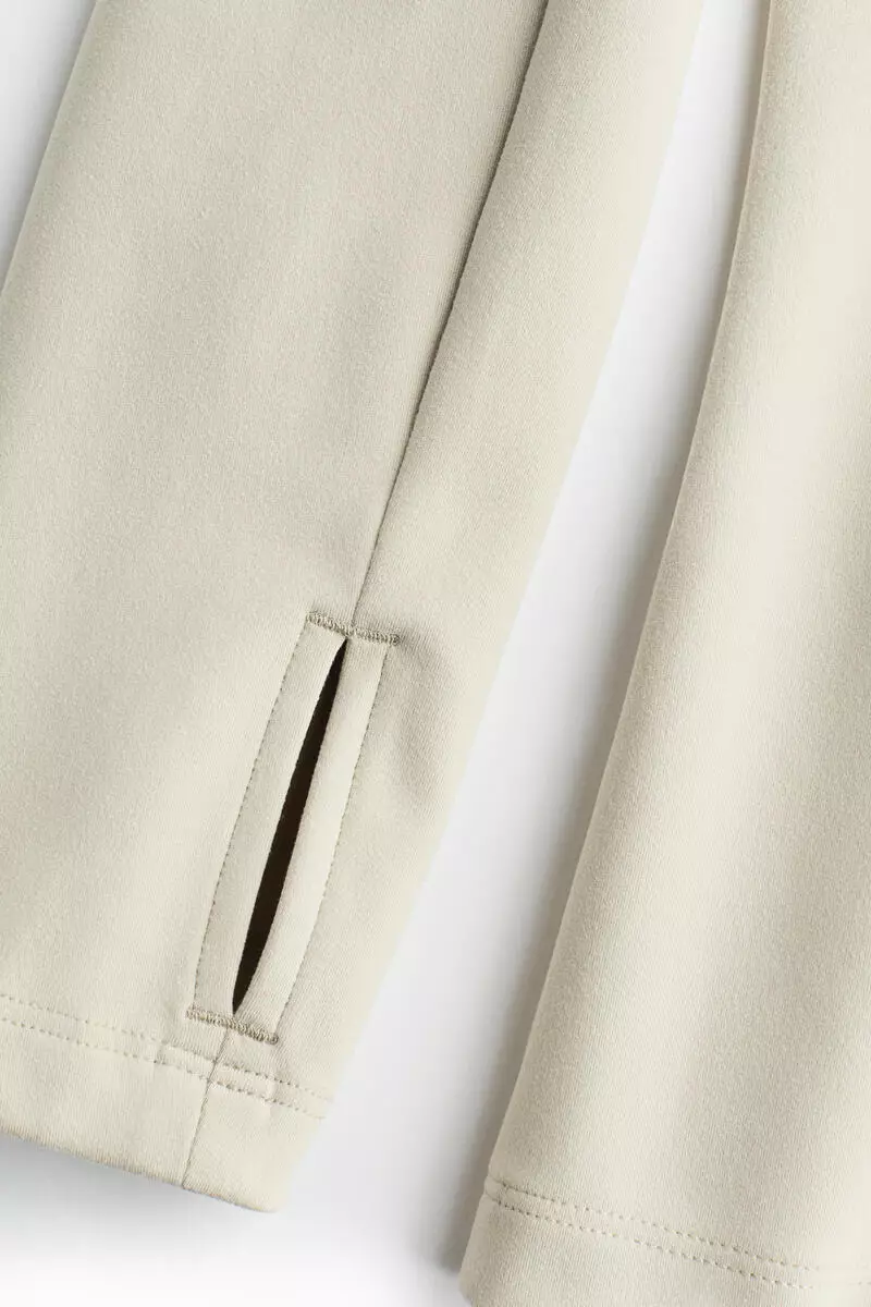 Zip-through sports jacket with SoftMove™