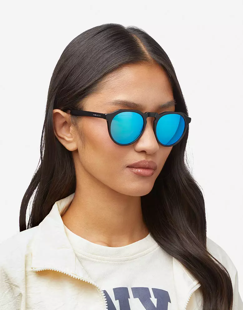 HAWKERS Diamond Black Clear Blue WARWICK X Sunglasses for Men and Women. Official Product Designed in Spain