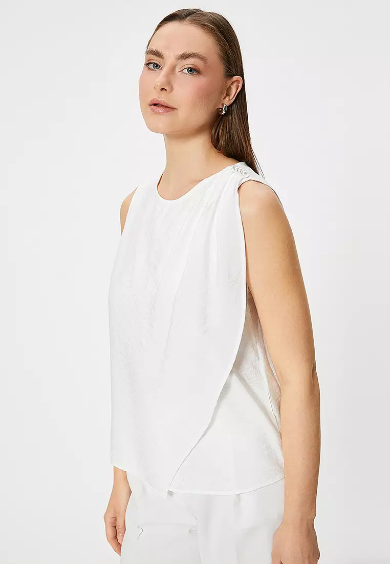Sleeveless Blouse with Pearl Detail