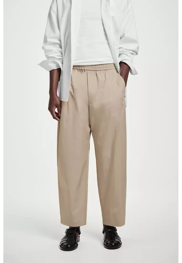 CROPPED ELASTICATED WIDE-LEG TROUSERS