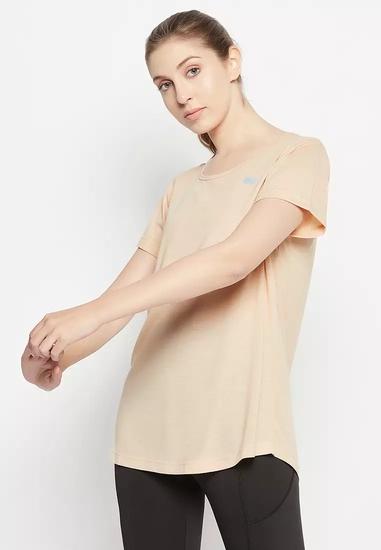 Clovia Comfort Fit Longline Active T-shirt in Cream Colour